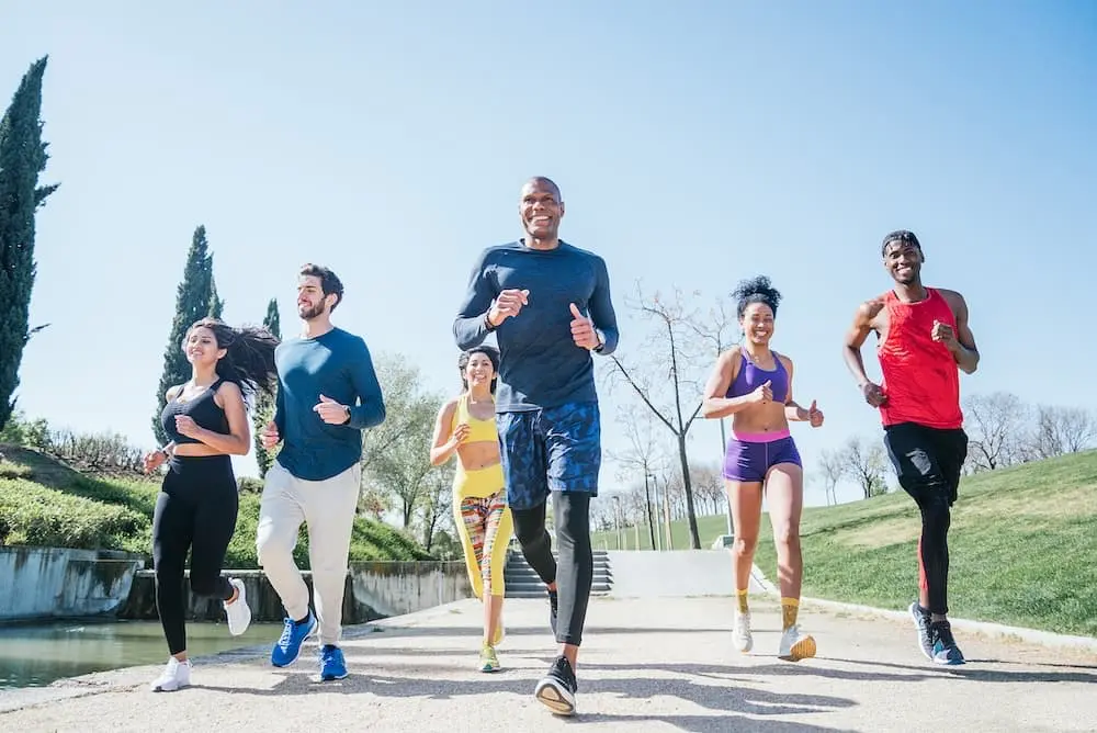 group of runners training in a park front view 2025 02 12 13 41 46 utc